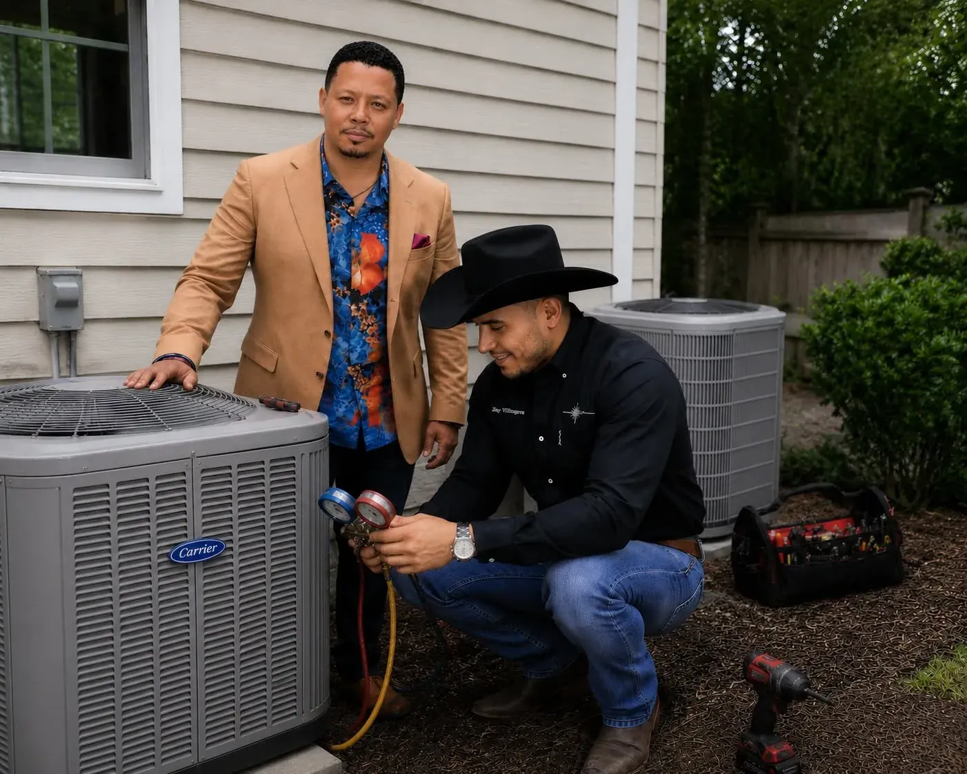 Jay Villegas checking refrigerant pressures with manifold gauges on a Carrier condenser